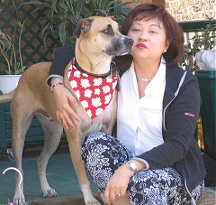Dr. Cheng Koh, with her dog, Otis